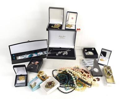 Lot 233 - A group of costume jewellery and watches to...