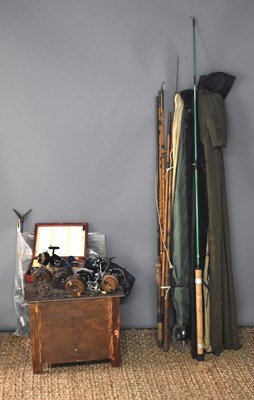 Lot 225 - A collection of fishing rods, some vintage...