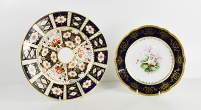 Lot 292 - A Coalport plate, hand painted to the centre...