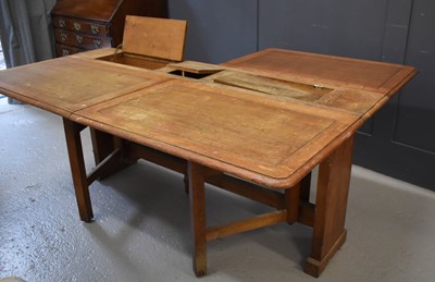 Lot 477 - An Arts & Crafts oak work table, with four...