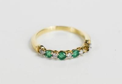 Lot 192 - A Kallati 9ct gold diamond and emerald nine...