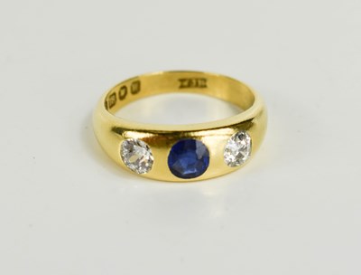 Lot 255 - An 18ct gold, diamond and deep cornflower blue...