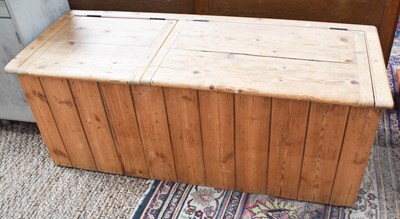 Lot 465 - An antique pine blanket chest with two lids...