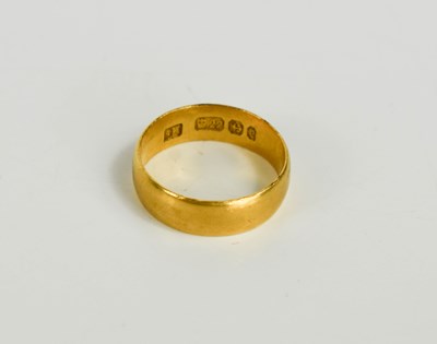 Lot 140 - A 22ct gold wedding band, size I, 3.69g.