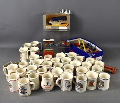 Lot 115 - A group of vintage toys to include a boxed...