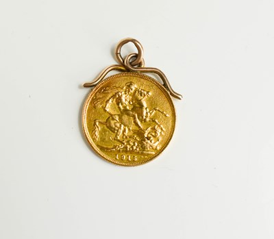 Lot 70 - A George V gold sovereign, dated 1915, in 9ct...