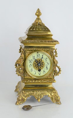 Lot 321 - An early 20th century brass mantle clock with...