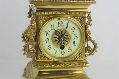 Lot 321 - An early 20th century brass mantle clock with...