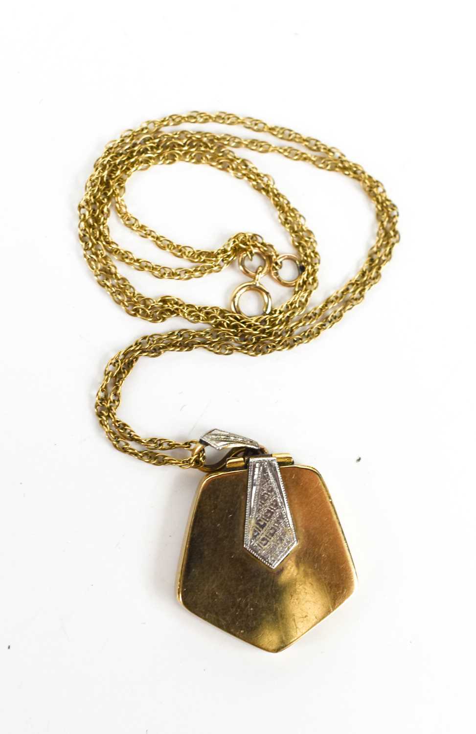Click H Locket Lot 94 - A 9ct gold locket and chain, the locket of