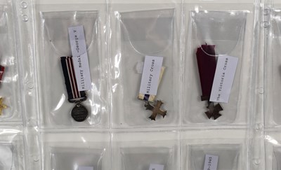 Lot 29 - A collection of miniature medals to include...
