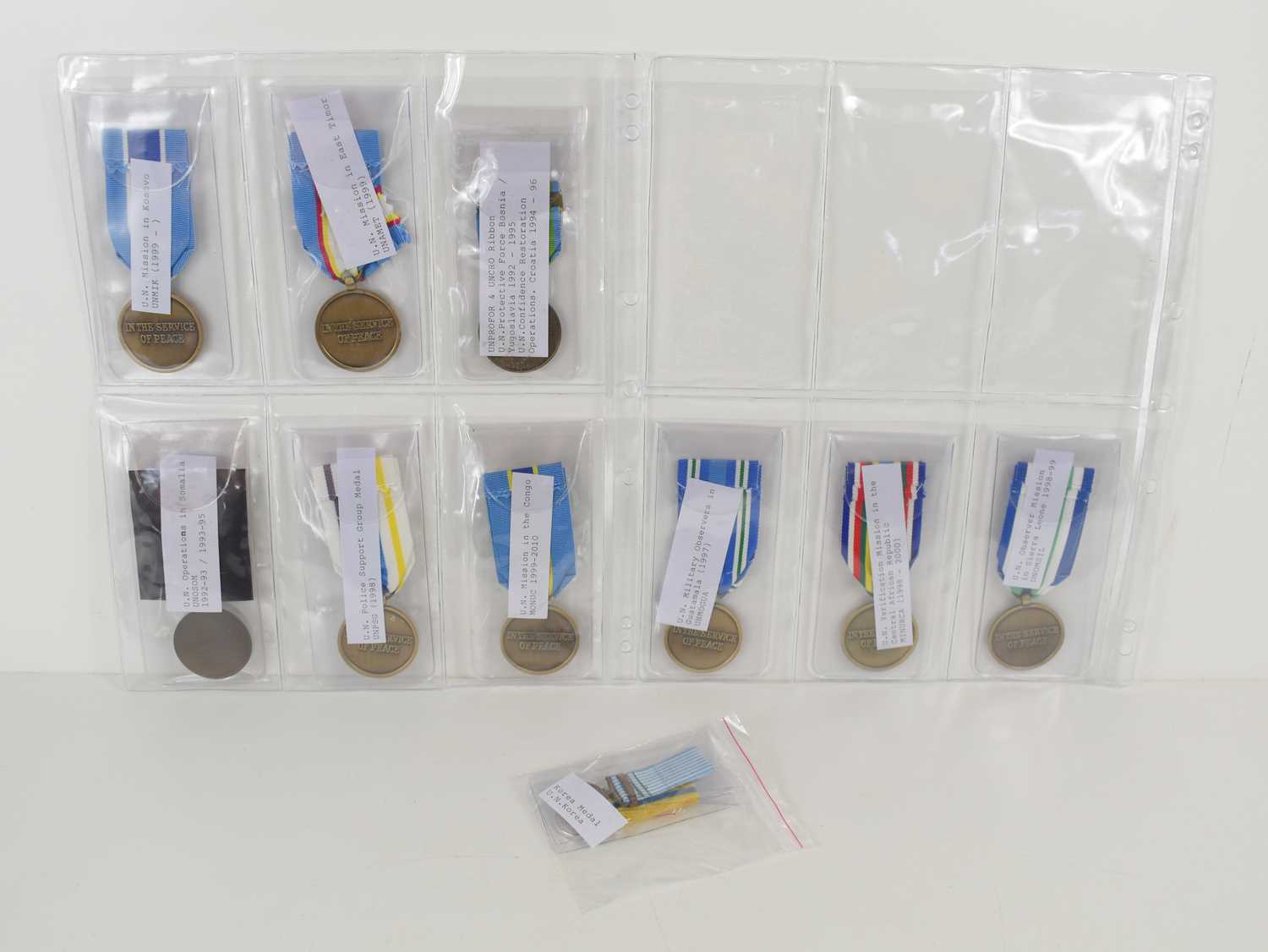 Lot 20 - A group of U.N medals to include Military...