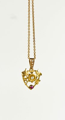 Lot 128 - A 15ct gold heart shaped pendant with leaf and...