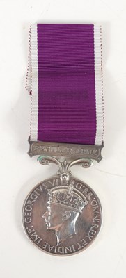 Lot 10 - A Long Service and Good Conduct medal awarded...