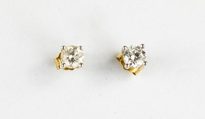 Lot 211 - A pair of white 18ct gold and diamond stud...