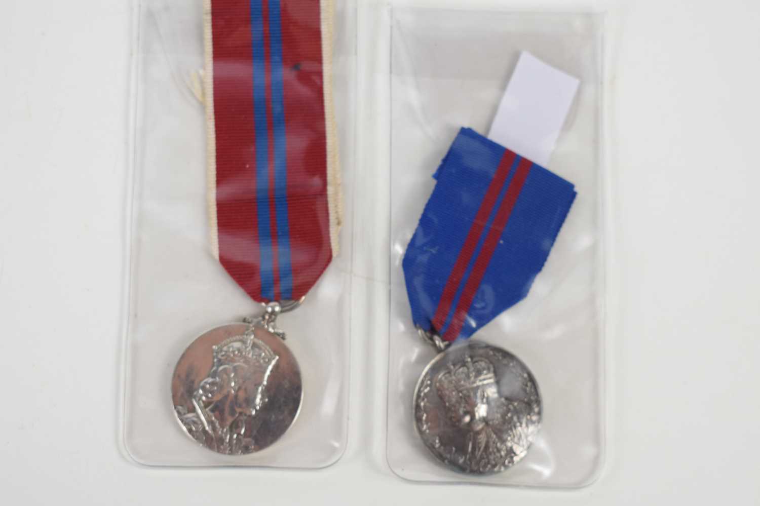 Lot 12 - A King George V Coronation medal 1911 together...