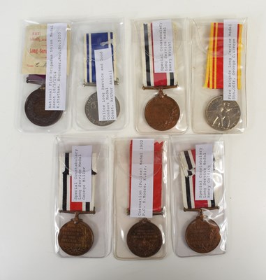 Lot 14 - A collection of Long Service Medals to include...