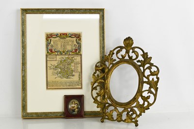 Lot 158 - A French gilt metal table frame, a map of...