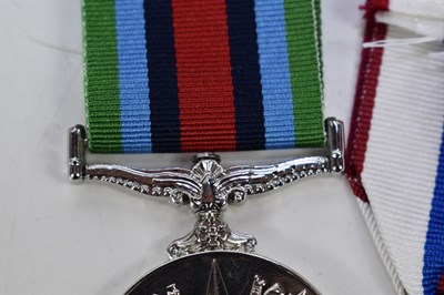 Lot 7 - A group of military medals to include a...