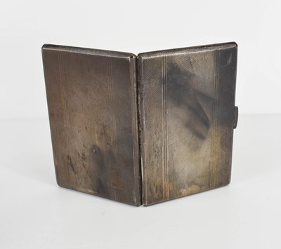 Lot 415 - A silver cigarette case of rectangular flat...