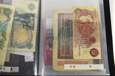 Lot 60 - A group of banknotes and coins to include six...