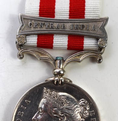 Lot 64 - A group of medals and military cloth badges to...