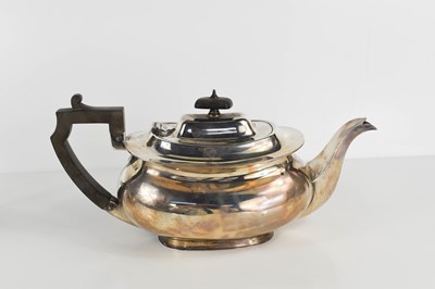 Lot 440 - An Art Deco silver teapot of squat form, with...