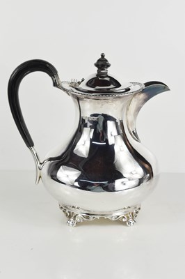 Lot 441 - A silver coffee pot, with ebonised handle and...