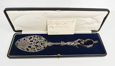 Lot 402 - A large silver presentation spoon, a copy of a...