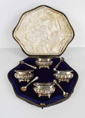 Lot 403 - A set of four silver salts with original...