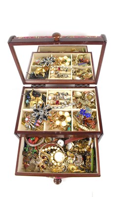 Lot 310 - A wooden jewellery box, covered with Liberty...