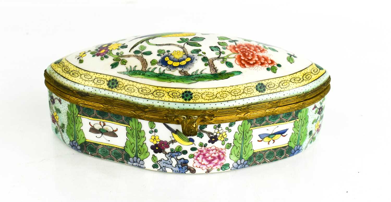 Lot 28 - A Victorian polychrome porcelain box, of oval...