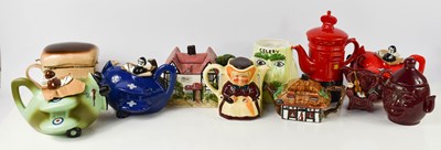 Lot 159 - A selection of novelty teapots, to include...