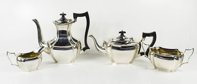 Lot 445 - A silver tea service comprising tea pot, hot...