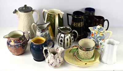 Lot 178 - A collection of Victorian and later jugs, to...
