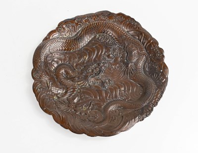 Lot 117 - A Chinese bronzed dish, embossed with a...