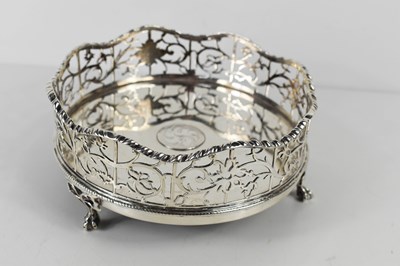 Lot 137 - A George III silver wine coaster with pierced...