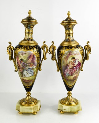 Lot 152 - A pair of fine French porcelain and ormolu...