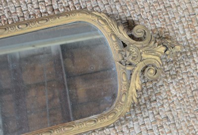 Lot 556 - A Victorian hall mirror, with decorative...