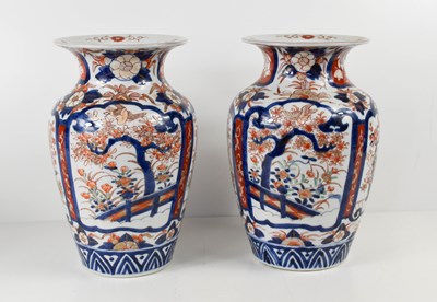 Lot 182 - A pair of 19th century Imari vases, 26cm high.