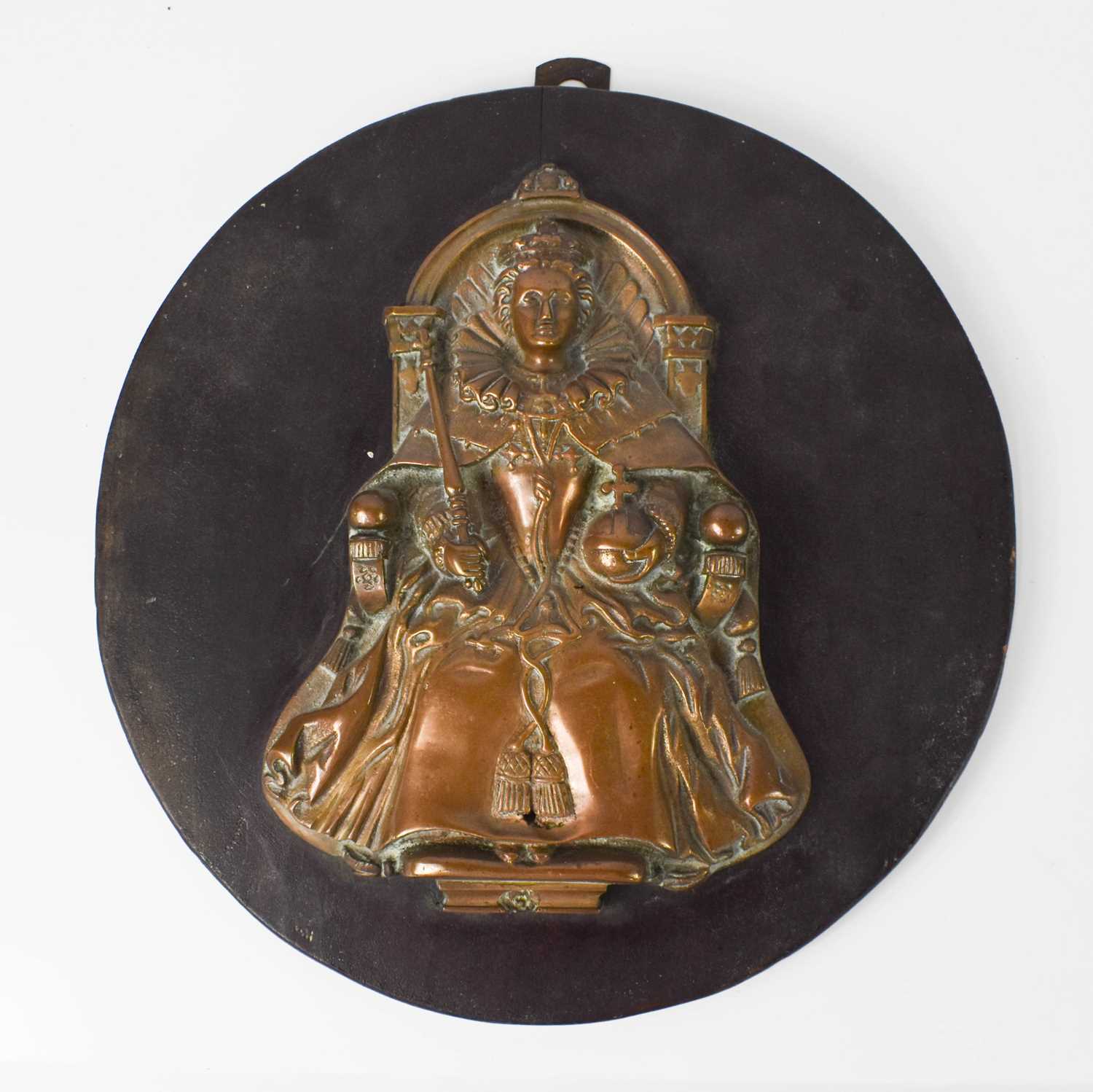 Lot 57 - A cast bronze or brass plaque depicting Queen...
