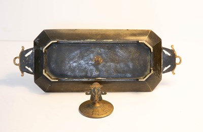 Lot 25 - An Egyptian Revival brass inkstand, the cover...