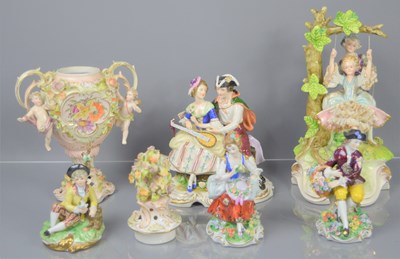 Lot 110 - A group of continental porcelain figures and...