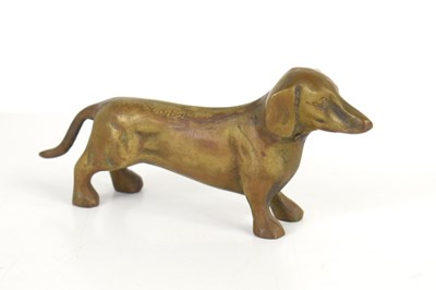 Lot 294 - A miniature bronze figure of a Dachshund, 7cm...