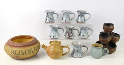 Lot 43 - A group of studio pottery to include six mugs...