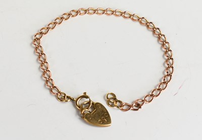 Lot 126 - A 9ct gold, delicate curb link charm bracelet,...