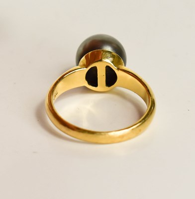 Lot 19 - An 18ct gold and pearl dress ring, the grey...