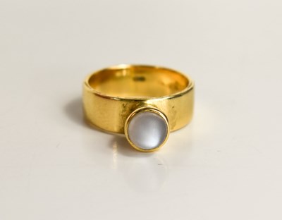 Lot 195 - An 18ct gold and moonstone ring, the moonstone...