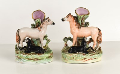 Lot 268 - A pair of 19th century Staffordshire spill...