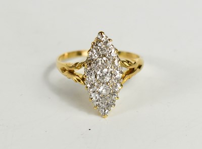 Lot 261 - An 18ct gold and diamond dress ring, the...