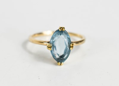 Lot 115 - A blue paste set dress ring, the oval stone of...